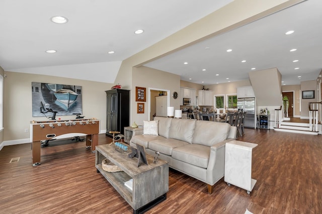 90 Paugus Park Rd, Laconia, NH 03246 - living room with dark wood finished floors, vaulted ceiling, baseboards, and recessed lighting