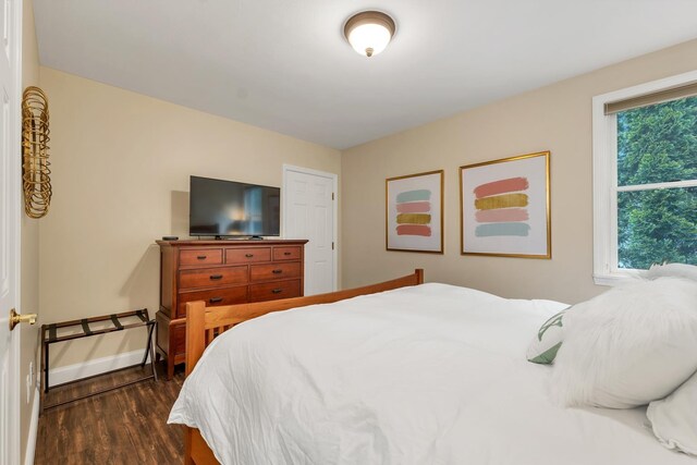 90 Paugus Park Rd, Laconia, NH 03246 - bedroom with dark wood-type flooring and baseboards