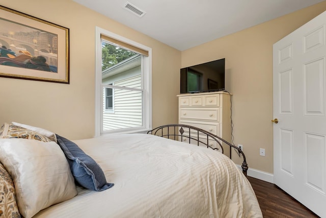 90 Paugus Park Rd, Laconia, NH 03246 - bedroom featuring dark wood finished floors and baseboards