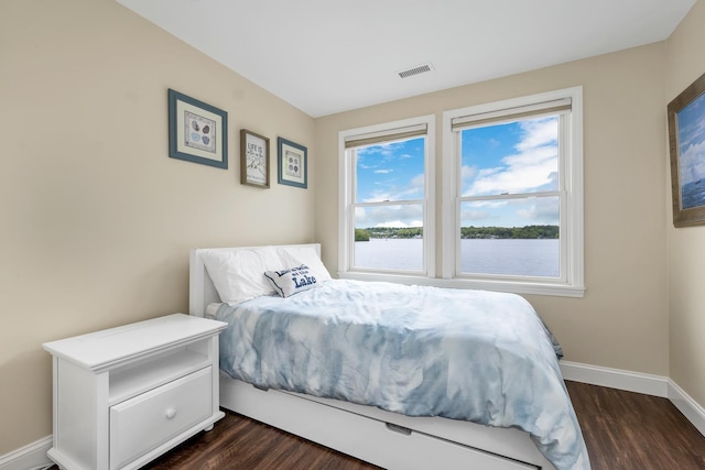 90 Paugus Park Rd, Laconia, NH 03246 - bedroom with dark wood-style flooring, baseboards, and a water view