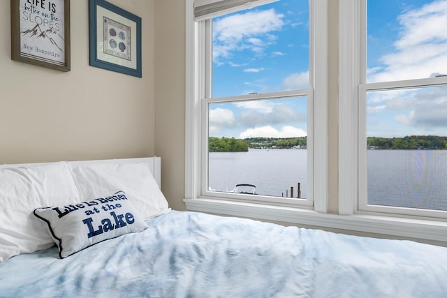 90 Paugus Park Rd, Laconia, NH 03246 - bedroom with multiple windows and a water view