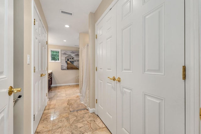 90 Paugus Park Rd, Laconia, NH 03246 - corridor featuring light marble finish flooring, baseboards, and recessed lighting