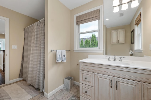 90 Paugus Park Rd, Laconia, NH 03246 - bathroom with baseboards, marble finish flooring, vanity, and curtained shower