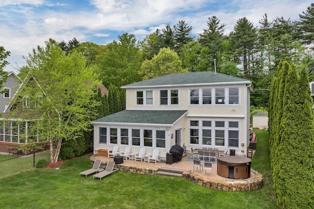 90 Paugus Park Rd, Laconia, NH 03246 - back of house featuring a fire pit, roof with shingles, a patio area, and a sunroom
