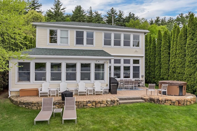 90 Paugus Park Rd, Laconia, NH 03246 - rear view of house with a hot tub, a patio, a shingled roof, and a yard