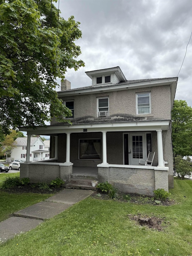 119 N Main St, Rutland City, VT 05701 - traditional style home featuring a porch, stucco siding, a chimney, and a front yard