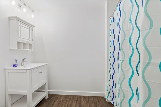 236 Macdowell Rd, Peterborough, NH 03458 - bathroom with vanity, wood finished floors, and baseboards
