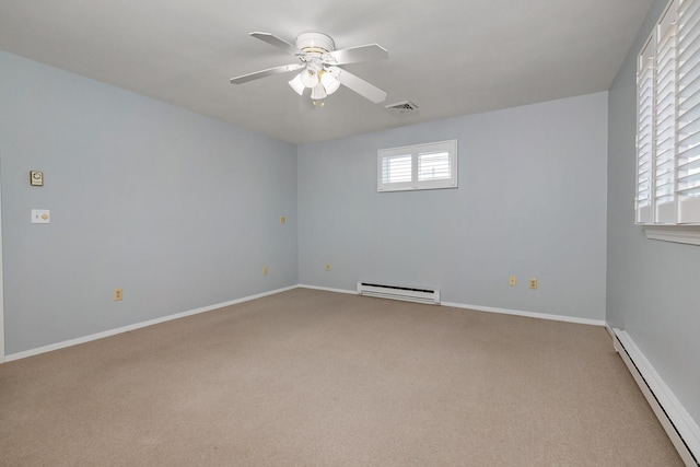 185 Kings Hwy, Hampton, NH 03842 - carpeted spare room with a baseboard radiator, baseboard heating, ceiling fan, and baseboards