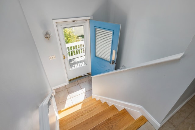 185 Kings Hwy, Hampton, NH 03842 - stairs with tile patterned floors and baseboards