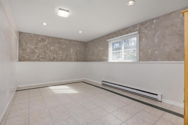 185 Kings Hwy, Hampton, NH 03842 - spare room with a baseboard heating unit, baseboards, recessed lighting, inlaid floor details, and tile patterned flooring