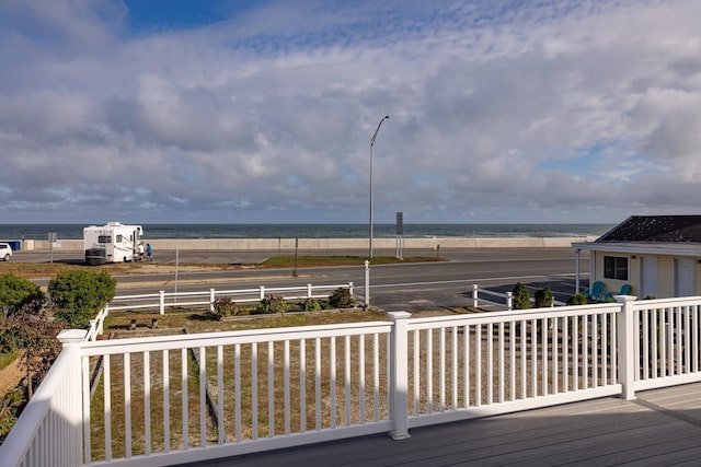 185 Kings Hwy, Hampton, NH 03842 - wooden deck with view of water and beach