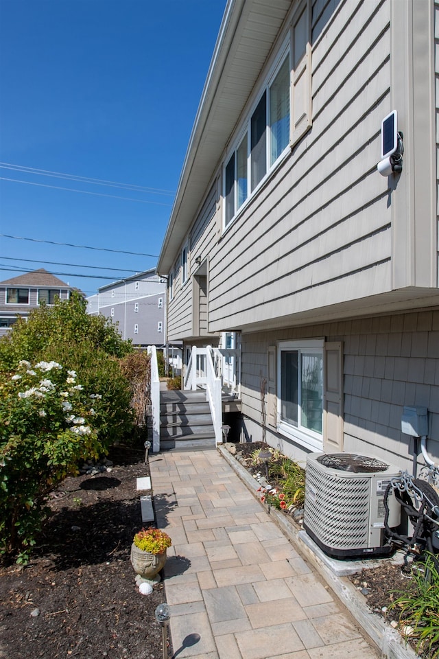 185 Kings Hwy, Hampton, NH 03842 - view of home's exterior with central air condition unit