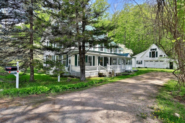 5100 Rte 100, Plymouth, VT 05056 - view of front of house featuring a porch, a detached garage, and driveway