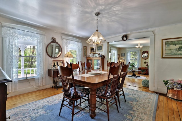 5100 Rte 100, Plymouth, VT 05056 - dining area with a chandelier and hardwood / wood-style flooring