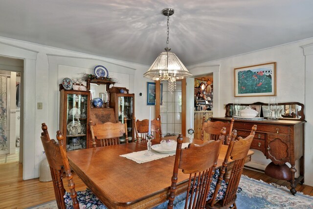 5100 Rte 100, Plymouth, VT 05056 - dining space with hardwood / wood-style flooring and a chandelier