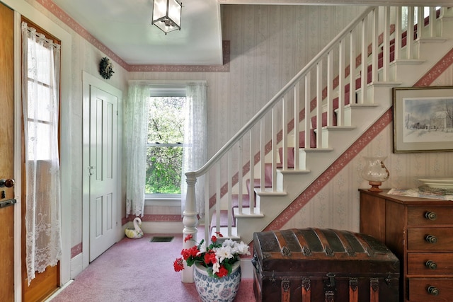 5100 Rte 100, Plymouth, VT 05056 - carpeted foyer entrance featuring wallpapered walls and stairs