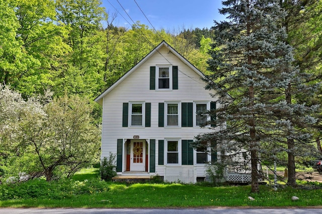 5100 Rte 100, Plymouth, VT 05056 - view of front of house with a forest view