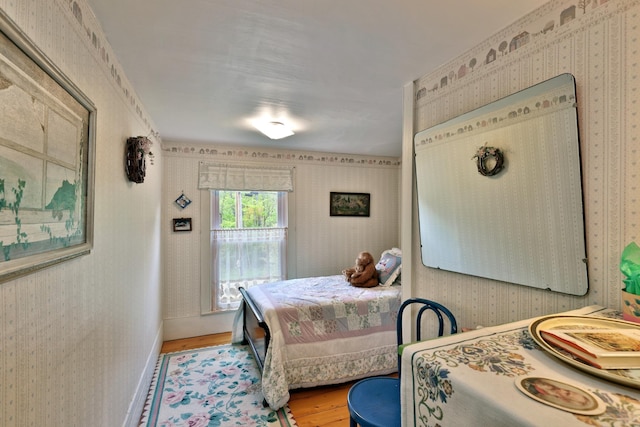 5100 Rte 100, Plymouth, VT 05056 - bedroom featuring light wood-style floors and wallpapered walls