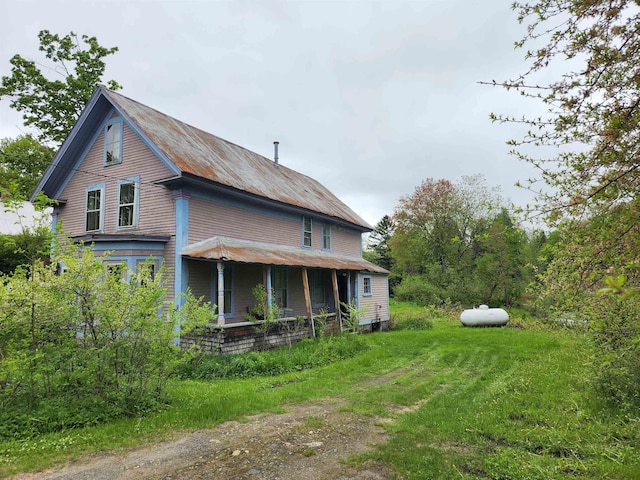 16 Northridge Rd, Burke, VT 05871 - rear view of house featuring covered porch