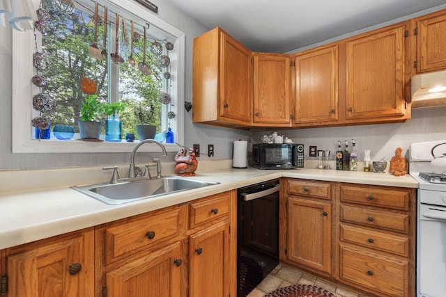 37 Thorndike Rd, Weare, NH 03281 - kitchen with black appliances, a sink, light countertops, and brown cabinets