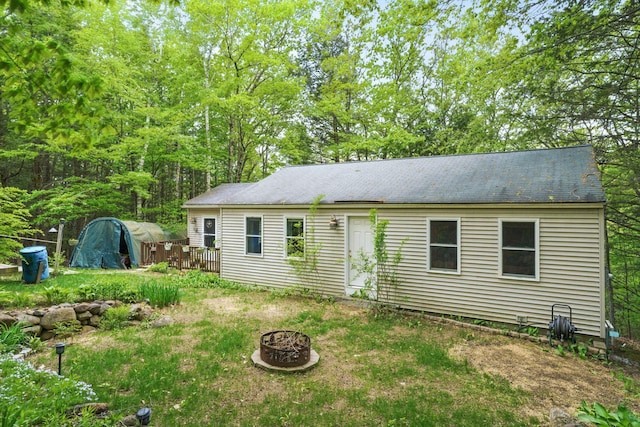 37 Thorndike Rd, Weare, NH 03281 - back of property featuring a fire pit