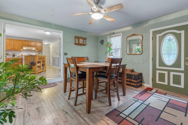 37 Thorndike Rd, Weare, NH 03281 - dining room with light wood finished floors, a ceiling fan, and baseboards