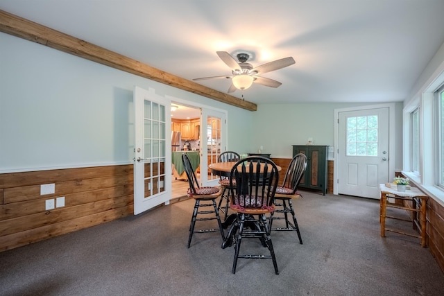 12 Emerald Cir, Goffstown, NH 03045 - carpeted dining area featuring french doors, wainscoting, wood walls, and ceiling fan