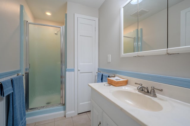 12 Emerald Cir, Goffstown, NH 03045 - full bath featuring a shower stall, tile patterned flooring, vanity, and recessed lighting