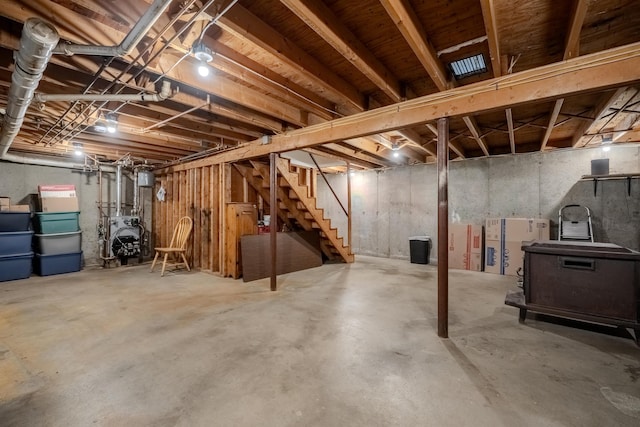 12 Emerald Cir, Goffstown, NH 03045 - unfinished basement with stairs and a heating unit
