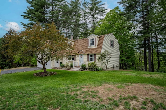 12 Emerald Cir, Goffstown, NH 03045 - dutch colonial featuring a gambrel roof, driveway, a front lawn, a chimney, and a shingled roof