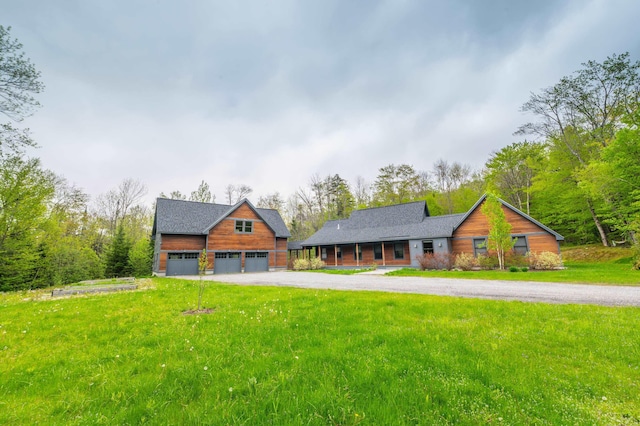 15 Spring Hill Rd, Dover, VT 05356 - view of front of property with driveway, a front lawn, an outbuilding, and a porch