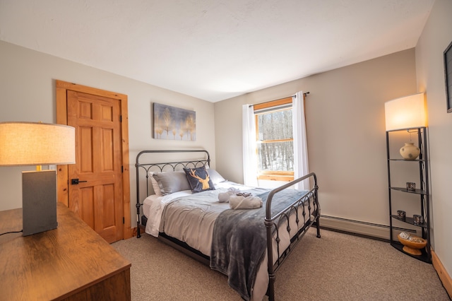 15 Spring Hill Rd, Dover, VT 05356 - bedroom with a baseboard radiator, light carpet, and baseboards