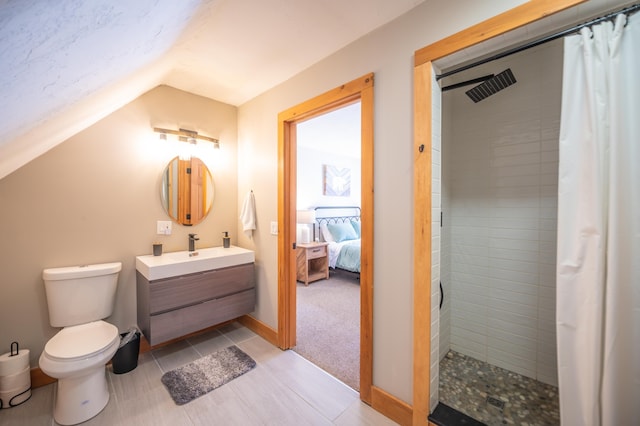 15 Spring Hill Rd, Dover, VT 05356 - bathroom with toilet, tiled shower, lofted ceiling, vanity, and ensuite bath