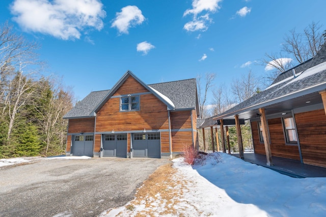15 Spring Hill Rd, Dover, VT 05356 - view of home's exterior featuring a shingled roof and driveway