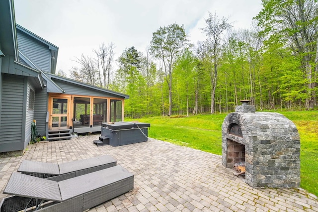 15 Spring Hill Rd, Dover, VT 05356 - view of patio featuring a hot tub, an outdoor stone fireplace, and a deck