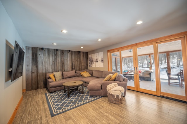 15 Spring Hill Rd, Dover, VT 05356 - living area featuring plenty of natural light, wood walls, recessed lighting, french doors, and wood finished floors
