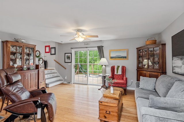 312 Browns Trce, Jericho, VT 05465 - living room with ceiling fan, light wood finished floors, stairway, and baseboards