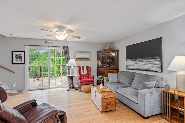 312 Browns Trce, Jericho, VT 05465 - living room featuring light wood-style floors, ceiling fan, and stairs