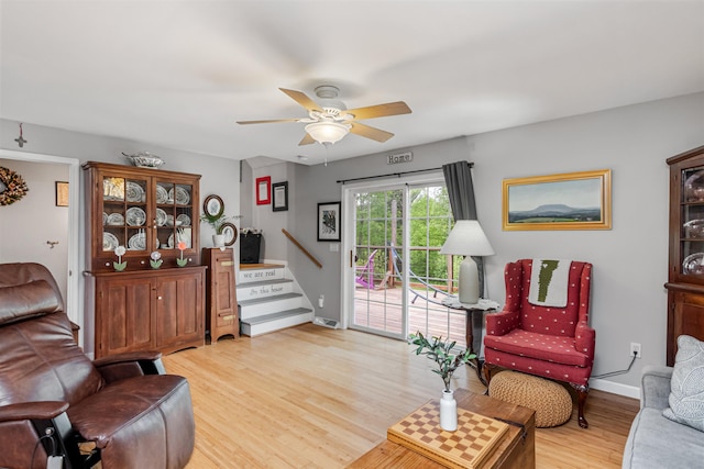 312 Browns Trce, Jericho, VT 05465 - living area featuring stairway, light wood-style floors, and a ceiling fan