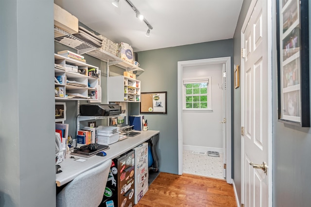 312 Browns Trce, Jericho, VT 05465 - home office featuring light wood-type flooring, baseboards, and rail lighting