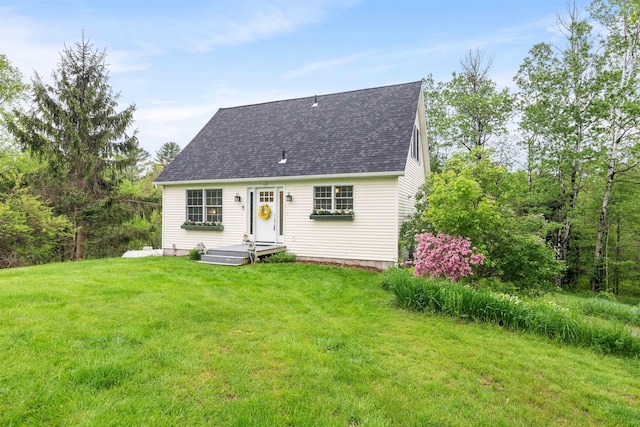 312 Browns Trce, Jericho, VT 05465 - cape cod-style house featuring roof with shingles and a front lawn