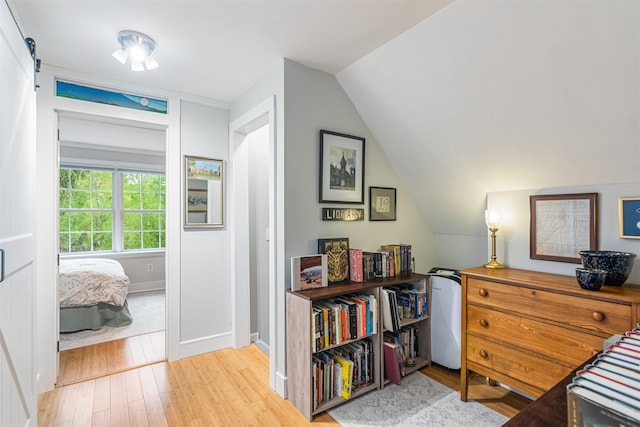 312 Browns Trce, Jericho, VT 05465 - bedroom with wood finished floors, baseboards, and lofted ceiling