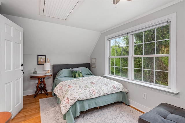 312 Browns Trce, Jericho, VT 05465 - bedroom with vaulted ceiling, light wood-style flooring, and baseboards