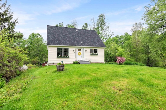 312 Browns Trce, Jericho, VT 05465 - cape cod home featuring a front yard and a shingled roof