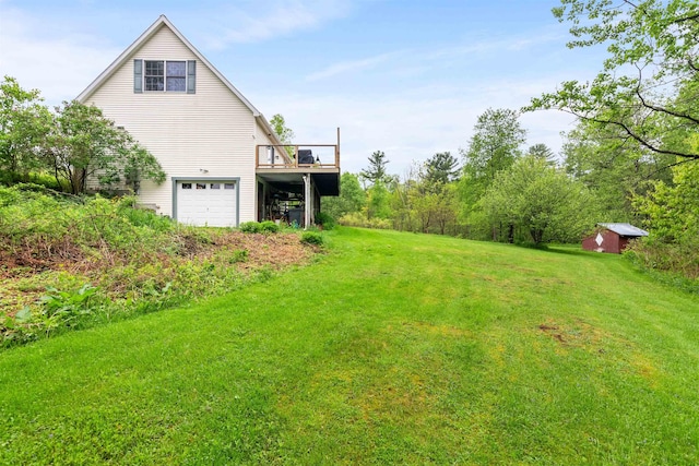 312 Browns Trce, Jericho, VT 05465 - view of green lawn with an attached garage and a wooden deck