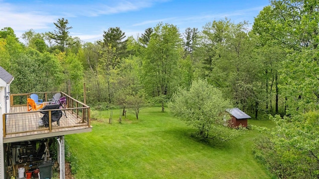 312 Browns Trce, Jericho, VT 05465 - view of grassy yard featuring a deck and a wooded view