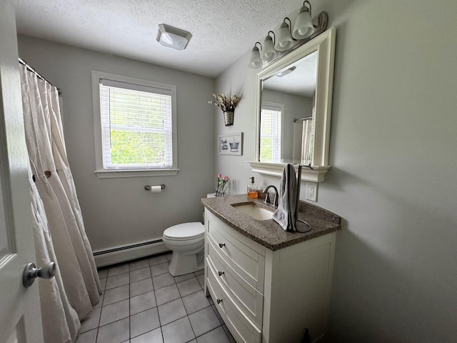 10 Irving Dr, Weare, NH 03281 - full bath with baseboard heating, plenty of natural light, vanity, tile patterned floors, and a textured ceiling