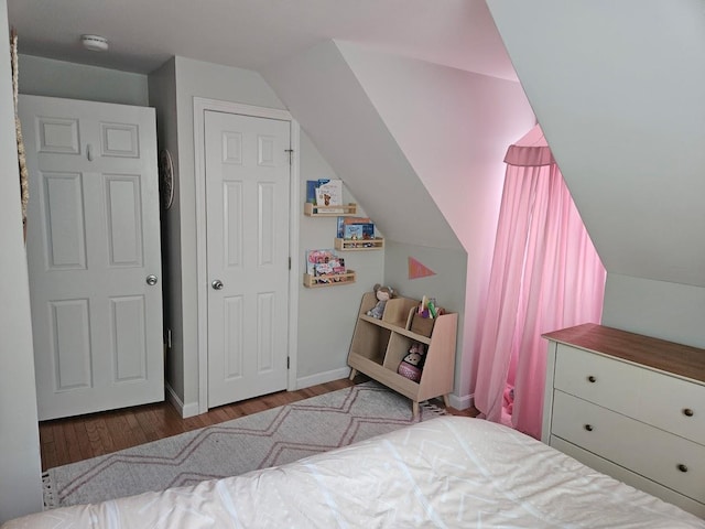 10 Irving Dr, Weare, NH 03281 - bedroom with wood finished floors, vaulted ceiling, and baseboards