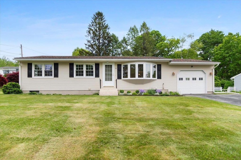 30 Harbour Rd, Bennington, VT 05201 - ranch-style home with a garage, driveway, a front yard, and entry steps