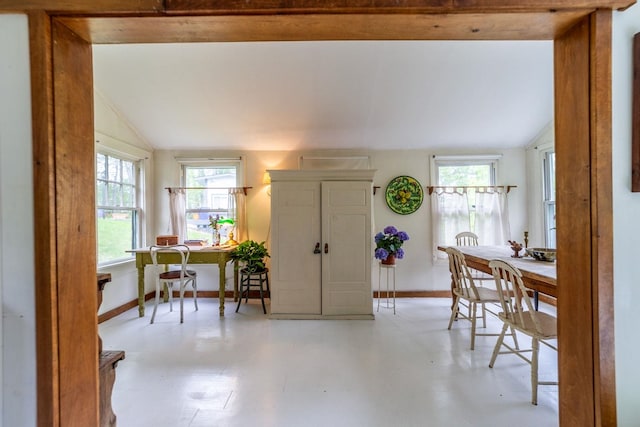 26 Don Gerry Rd, Bristol, NH 03222 - dining space with lofted ceiling, an office area, and baseboards